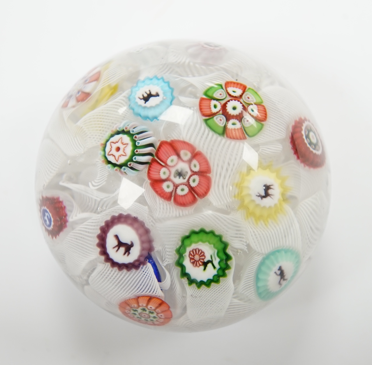 A Baccarat glass upset muslin paperweight, 6cm in diameter